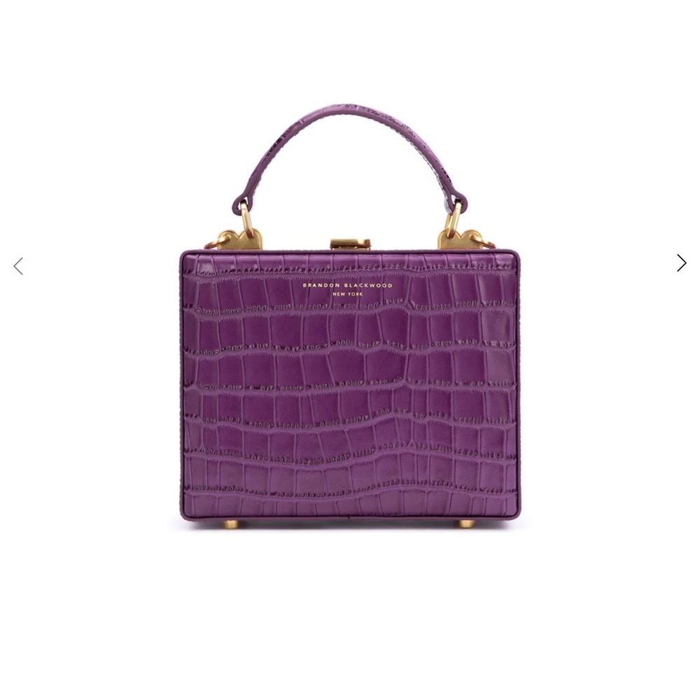 Brandon Blackwood croc leather trunk.